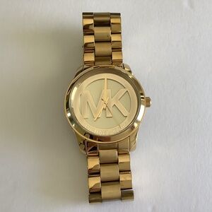 Ladies Michael Kors Gold initial Watch brand new condition